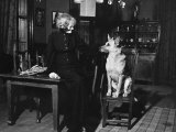 Madame Maud Gonne Macbride, Standing in the Dining Room with Cassan, One of Her Dogs