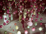 West Coast Youth Dancing under Balloons at Mardi Gras Party