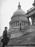 Man Walking Up Steps of Us Capitol