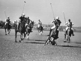 Men Playing Polo