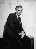 Cartoonist James Thurber Posing with His Work