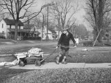 Child Collecting Scrap Paper for the War Effort