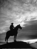 Silhouettes of Cowboy Mounted on Horse