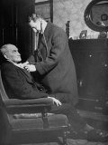 Doctor Making a House Call to an Ill Elderly Man, Listening to the Rhythm of His Heart