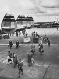Buy Passengers Leaving a Twa Flight at the Airport at AllPosters.com