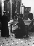 Priests Playing Ping-Pong at Social School