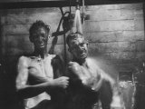 Coal-Blakened Rescue Miners Showering after Mine Disaster