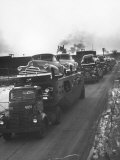 Buy Newly-Made Pontiacs Being Transported on Trucks at AllPosters.com