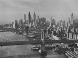Buy New York City Behind the Brooklyn and Manhattan Bridges That are Hovering over the East River at AllPosters.com