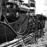El Barco Oil Being Piped into Texaco and Socony-Vacuum Tankers