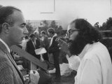 Buy Hippie Poet Allen Ginsberg Speaking to Conservative-Looking Man During Vietnam War Protest Rally at AllPosters.com