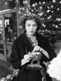 Fashion Model Suzy Parker with a Camera