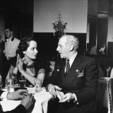 Merle Oberon and Walter Winchell Chatting at the Stork Club