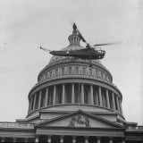 Buy First Successful Us Army Helicopter Designed by Igor Sikorsky Flying Past the Capitol Dome at AllPosters.com