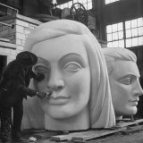Heads of Figures Weigh About 600 Pounds Each
