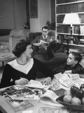 Buy American Housewife Margaret Carson Sitting at Home with Her Husband and Son at AllPosters.com