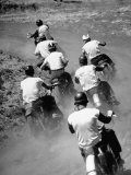 Buy Riders Enjoying Motorcycle Racing, Leaving a Trail of Dust Behind at AllPosters.com