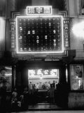 Exterior of Gambling Hall with Illuminated Board Flashing Winning Numbers