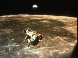 Buy Apollo 11's Lunar Module Flying over the Moon with Earth in the Bkgrd at AllPosters.com