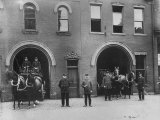 Firefighters Posing in Front of their Firehouse