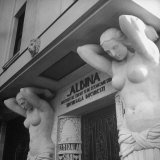Plaster Figures Decorating Entrance of Bank