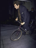 Buy John F. Kennedy Jr. Riding on His Bike at AllPosters.com