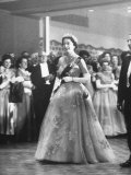 Queen Elizabeth and Philip Walking Through Ball Room