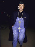 Buy Singer Songwriter Elton John Wearing Overalls and a Large Cross Necklace at AllPosters.com