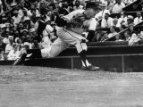 Baseball Player Johnny Antonelli Pitching a Ball