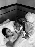 Actress Patricia Neal at Home W. New Born Daughter Lucy; Neal Suffered a Stroke Giving Birth