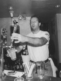 Actor Bruce Willis Working as a Bartender at His Restaurant Planet Hollywood
