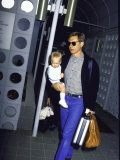 Buy Actor Harrison Ford, Wearing Sunglasses, Holding Son Malcolm at AllPosters.com