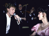 Performer Andy Gibb Singing to Girlfriend, Actress Victoria Principal