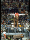Soviet Gymnast Olga Korbut in Action on the Balance Beam at the Summer Olympics