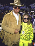 Actors Larry Hagman, Wearing Cowboy Hat, and Charlene Tilton, Both Wearing Sunglasses