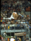 Soviet Gymnast Olga Korbut in Action on the Balance Beam at the Summer Olympics