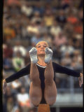 US Gymnast Kathy Rigby Performing on the Balance Beam at the Summer Olympics
