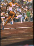 US Track Athlete Eddie Hart Running the 400 Meter Relay at the Summer Olympics