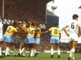 Buy Teammates Mobbing Brazilian Soccer Star Pele after a Goal Vs. Hungary During World Cup Competition at AllPosters.com