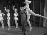 Actor Clowning around with Dancing Girls During the Nightlife in Las Vegas