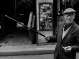 American Author Henry Miller Walking Along the Street