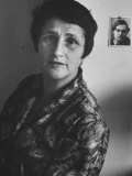 Artist Jeanne Modigliani in Front of a Picture of Her Father Amedeo Modigliani