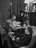 Buy Elsa Triolet Reading a Newly Bought and Still Uncut Book While Louis Aragon Writes His Poem at AllPosters.com
