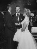 Dinah Shore and George Montgomery, Talking at the Cocktail Party