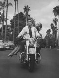 Brazilian Playboy Millionaire Francisco Pignatari and Model Barbara Cailleux Riding a Motorcycle