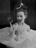 Buy Actress Jeanne Crain Taking Bubble Bath for Her Role in Movie "Margie" at AllPosters.com