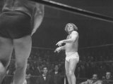 Gorgeous George Wagner Taunting His Opponent During Professional Wrestling Match