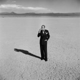 British Entertainer Noel Coward in Middle of Desert, Dressed for His Nightclub Act