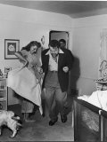 Buy Married Actors Orson Welles and Rita Hayworth Pretending to Bullfight at Home at AllPosters.com