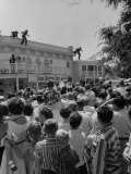 Buy Actor Guy Williams as Zorro Leaping from a Roof During a Show at Disneyland at AllPosters.com